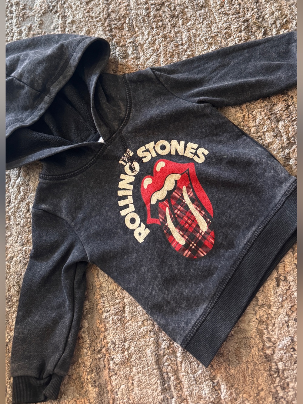 the Rolling Stones Black Baby Hoodie with Red Plaid Tongue Graphic